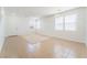 Bright living room with tile flooring, modern light fixture, and ample natural light at 3517 Colby Creek Ave, North Las Vegas, NV 89081