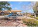 Community playground with slides and shade, providing a fun and safe play area for children at 3517 Colby Creek Ave, North Las Vegas, NV 89081