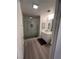 Modern bathroom featuring a large glass shower, neutral colored walls, and contemporary vanity providing a clean and elegant design at 353 E Bonneville Ave # 449, Las Vegas, NV 89101