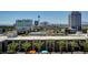 Building exterior with palm trees and a Las Vegas skyline view at 353 E Bonneville Ave # 449, Las Vegas, NV 89101