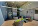 Comfortable outdoor lounge area with cozy seating, ambient lighting, and a projector screen at 353 E Bonneville Ave # 449, Las Vegas, NV 89101