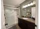 Bathroom featuring granite counters, white tiling and sliding shower door at 3550 Bay Sands Dr # 3044, Laughlin, NV 89029