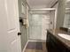Bathroom featuring granite counters, white tiling and sliding shower door at 3550 Bay Sands Dr # 3044, Laughlin, NV 89029