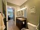 Bathroom featuring granite vanity, framed mirror, and walk-in shower at 3550 Bay Sands Dr # 3044, Laughlin, NV 89029