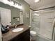 Bathroom with granite countertop vanity, shower with glass doors, and neutral color palette at 3550 Bay Sands Dr # 3044, Laughlin, NV 89029