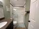 Bathroom featuring modern shower, granite vanity, and neutral tiling at 3550 Bay Sands Dr # 3044, Laughlin, NV 89029