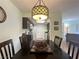 Dining room and kitchen area with tile floors and neutral paint at 3550 Bay Sands Dr # 3044, Laughlin, NV 89029