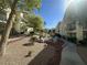 Landscaped condo buildings with mature trees, shrubs, and well-maintained pathways at 3550 Bay Sands Dr # 3044, Laughlin, NV 89029