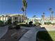 Attractive condo complex with landscaped grounds, swimming pool, and palm trees at 3550 Bay Sands Dr # 3044, Laughlin, NV 89029