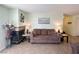 Cozy living room featuring a comfortable sofa, tile flooring, and a charming fireplace at 3550 Bay Sands Dr # 3044, Laughlin, NV 89029