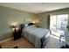 Comfortable main bedroom featuring a sliding glass door to the balcony at 3550 Bay Sands Dr # 3044, Laughlin, NV 89029