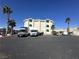 Parking lot features a building with covered awnings, with a few RVs, campers, and trailers at 3550 Bay Sands Dr # 3044, Laughlin, NV 89029