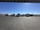 Open parking lot showing different RVs and trailers available for storage, under a clear blue sky at 3550 Bay Sands Dr # 3044, Laughlin, NV 89029