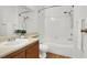 Cozy bathroom with a shower-tub combination and wood-finished vanity at 3609 Melonies Dr # 93, Las Vegas, NV 89103
