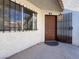 Exterior shot of unit #93 with a security door and a window with bars at 3609 Melonies Dr # 93, Las Vegas, NV 89103