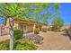 Private backyard featuring low-maintenance desert landscaping, creating a serene and spacious outdoor retreat at 4399 Luciano Ave, Pahrump, NV 89061