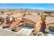 Charming single-story home with desert landscaping, mountain views, and a two-car garage at 4399 Luciano Ave, Pahrump, NV 89061