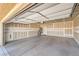 Spacious three car garage with ample space for vehicles and storage with a newer water heater at 4399 Luciano Ave, Pahrump, NV 89061