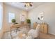 Well-lit home office space with a sleek desk, comfortable seating, and stylish decor for a productive work environment at 4399 Luciano Ave, Pahrump, NV 89061