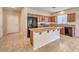 Well-lit kitchen features granite countertops, stainless appliances, and ample storage at 4399 Luciano Ave, Pahrump, NV 89061