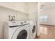 Laundry room features a Samsung washer and dryer at 4405 Testarossa Ln, North Las Vegas, NV 89081
