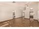 Spacious living room with tile floors, lots of light, and access to other rooms at 4405 Testarossa Ln, North Las Vegas, NV 89081