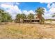 Wide shot of the backyard showing the home exterior and patio at 4678 Saddle Pl, Las Vegas, NV 89119