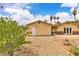 Spacious backyard featuring gravel landscaping and a detached structure at 4678 Saddle Pl, Las Vegas, NV 89119