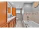 Bathroom featuring dual vanity, tile flooring, and a shower and tub at 4678 Saddle Pl, Las Vegas, NV 89119