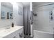 Bathroom with shower-tub, white vanity, and neutral decor at 4678 Saddle Pl, Las Vegas, NV 89119