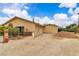 Side view of a home with detached garage and plenty of parking space at 4678 Saddle Pl, Las Vegas, NV 89119