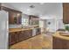 Well-appointed kitchen with stainless steel appliances, granite countertops, and a breakfast nook at 4678 Saddle Pl, Las Vegas, NV 89119