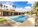 Inviting pool and spa area with an expansive covered patio, perfect for outdoor relaxation at 4678 Saddle Pl, Las Vegas, NV 89119