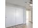 Bright bedroom featuring closet with sliding doors and neutral paint scheme at 5200 Longridge Ave, Las Vegas, NV 89146