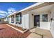 Close-up of the home's entrance, showcasing the front door and surrounding landscaping at 5200 Longridge Ave, Las Vegas, NV 89146