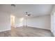 This living room has hardwood floors and a ceiling fan at 5200 Longridge Ave, Las Vegas, NV 89146