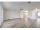 Spacious living room with hardwood floors and plenty of natural light at 5200 Longridge Ave, Las Vegas, NV 89146