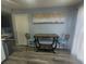 Cozy dining area with table seating and elegant decor adjacent to the kitchen at 5404 Walcott Dr, Las Vegas, NV 89118