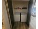 Convenient laundry closet featuring a stacked washer and dryer for efficient use of space at 5404 Walcott Dr, Las Vegas, NV 89118