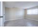Bright bedroom featuring tile floors, neutral walls, a bright window, and ample natural light at 605 S Royal Crest Cir # 20, Las Vegas, NV 89169