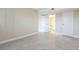 Primary bedroom features tile floor, neutral paint, and ensuite bathroom at 605 S Royal Crest Cir # 20, Las Vegas, NV 89169