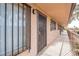 Balcony view with security doors and window bars in an apartment complex at 605 S Royal Crest Cir # 20, Las Vegas, NV 89169
