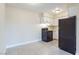 Bright kitchen features tiled floor, black range, and black refrigerator at 605 S Royal Crest Cir # 20, Las Vegas, NV 89169