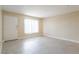 Neutral living room features tile floors, a bright window, and natural light at 605 S Royal Crest Cir # 20, Las Vegas, NV 89169