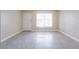 Inviting living room with tiled floor, neutral walls, and bright window at 605 S Royal Crest Cir # 20, Las Vegas, NV 89169