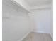 Bright walk-in closet with neutral paint and carpet at 605 S Royal Crest Cir # 20, Las Vegas, NV 89169