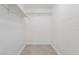 A walk-in closet featuring neutral paint and built-in shelving at 605 S Royal Crest Cir # 20, Las Vegas, NV 89169