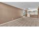 Spacious bonus room showcasing plush carpeting, neutral paint, and a window for natural light at 6148 Whitelion Walk St, Las Vegas, NV 89148