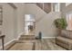 Inviting living room features neutral tones, high ceilings, and elegant decor at 6148 Whitelion Walk St, Las Vegas, NV 89148
