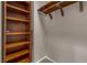 Walk-in closet features custom shelving and hanging rods for efficient storage solutions at 6148 Whitelion Walk St, Las Vegas, NV 89148